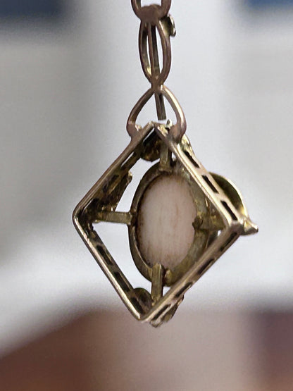Antique 9k Gold Cameo Pendant with Sculpted Leaves & Delicate Openwork Frame