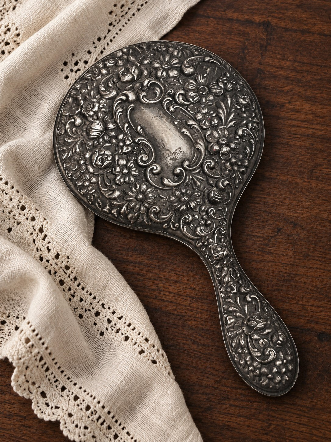 Antique Sterling Silver Floral Repoussé Hand Mirror