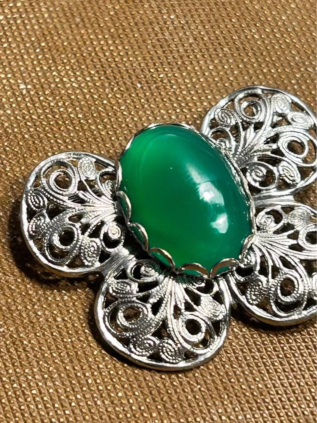 Mid-Century Vintage Silver-Tone Filigree Butterfly Brooch with Vibrant Green Glass Cabochon