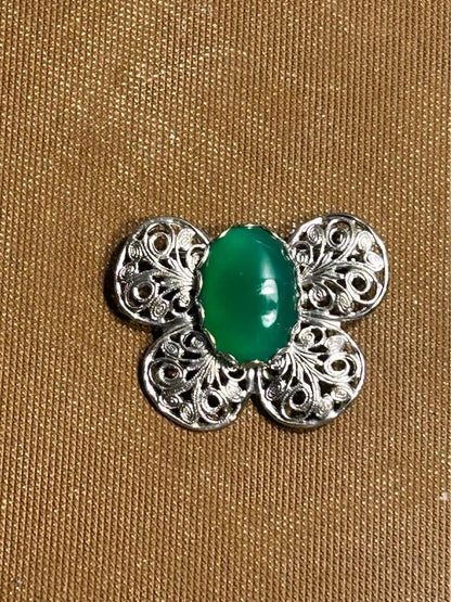 Mid-Century Vintage Silver-Tone Filigree Butterfly Brooch with Vibrant Green Glass Cabochon