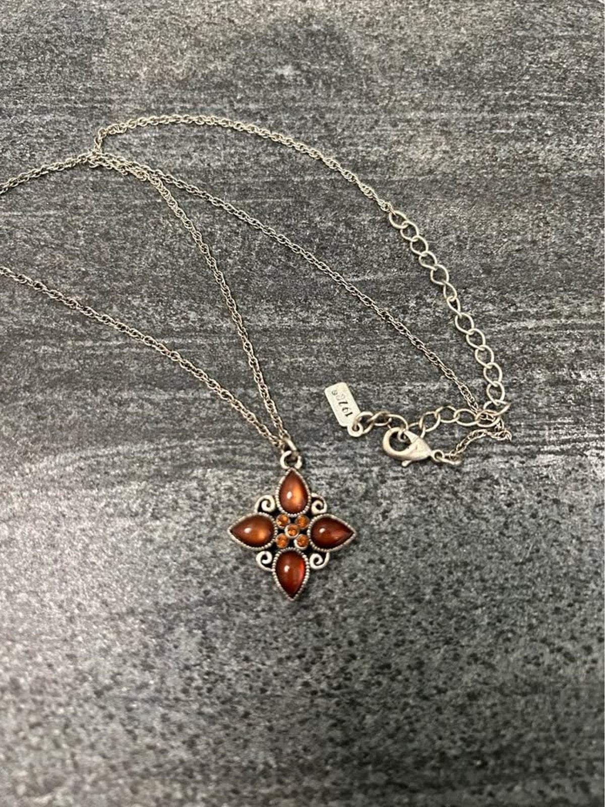 1928 Jewelry Company Silver Tone Quatrefoil Pendant Necklace with Amber Glass