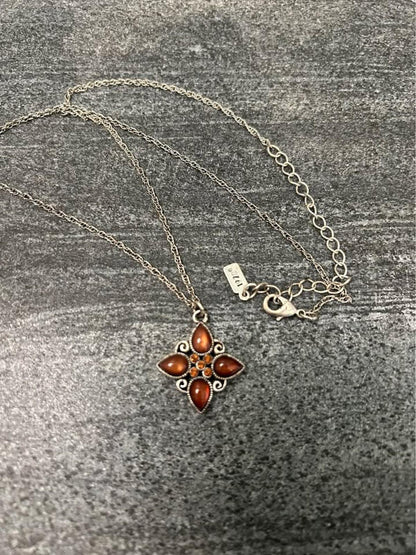 1928 Jewelry Company Silver Tone Quatrefoil Pendant Necklace with Amber Glass