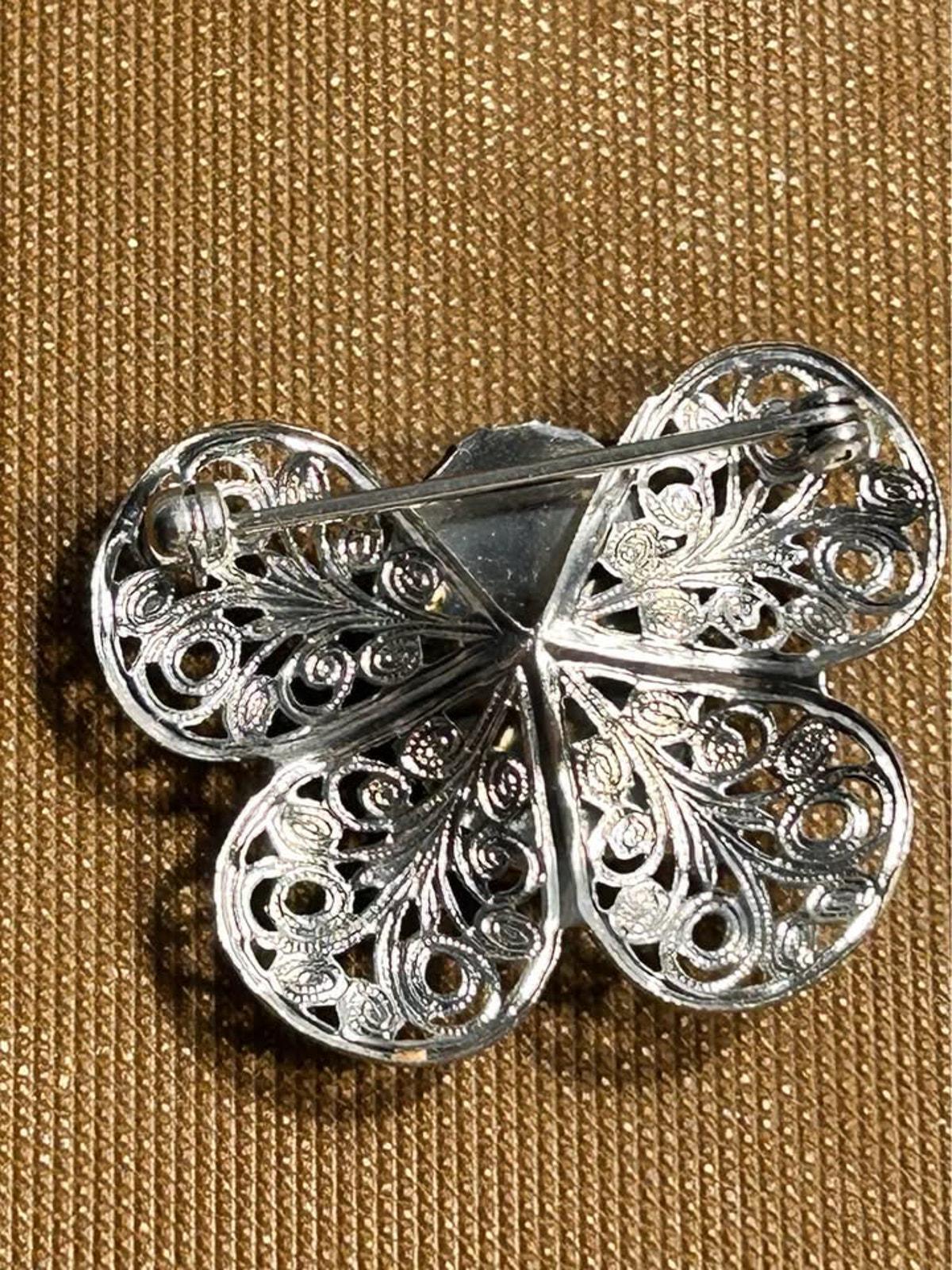 Mid-Century Vintage Silver-Tone Filigree Butterfly Brooch with Vibrant Green Glass Cabochon