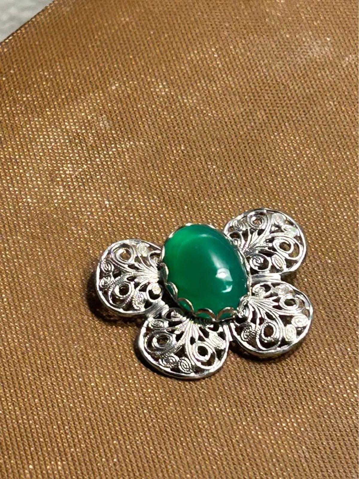 Mid-Century Vintage Silver-Tone Filigree Butterfly Brooch with Vibrant Green Glass Cabochon