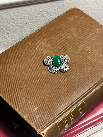 Mid-Century Vintage Silver-Tone Filigree Butterfly Brooch with Vibrant Green Glass Cabochon