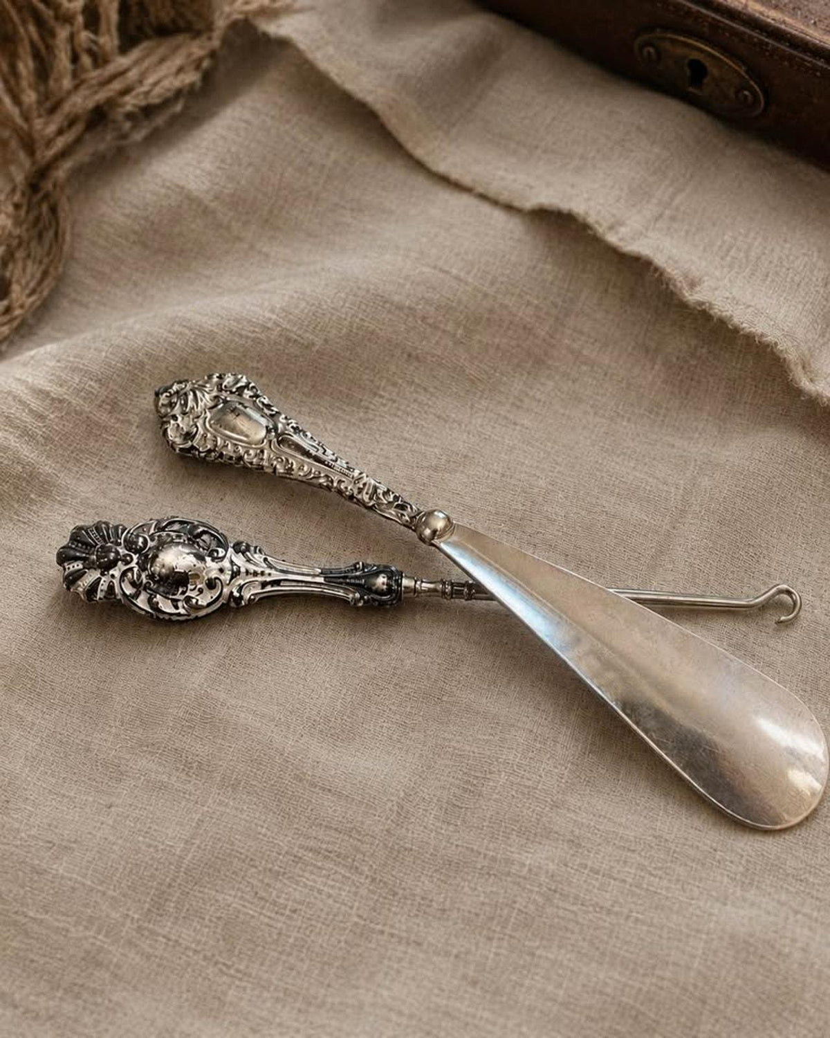 Antique Sterling Silver Repoussé Shoe Horn and Button Hook Vanity Set